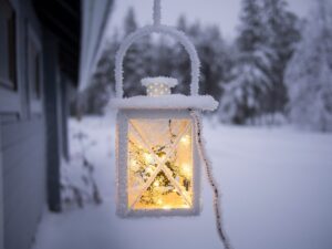 Hanging lamp outside a winter garden room.